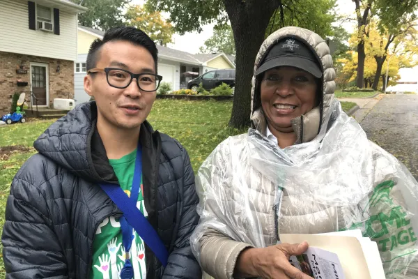 Member Organizers David Yang (Local 34) and Starr Suggs (Local 3142) knock doors in Richfield, Minnesota